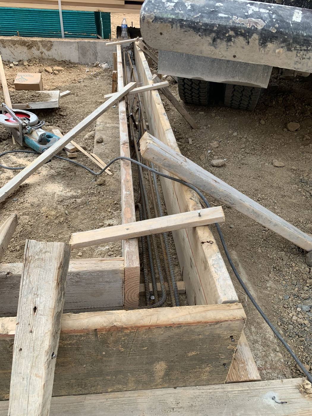 Grade beam forms and reinforcing