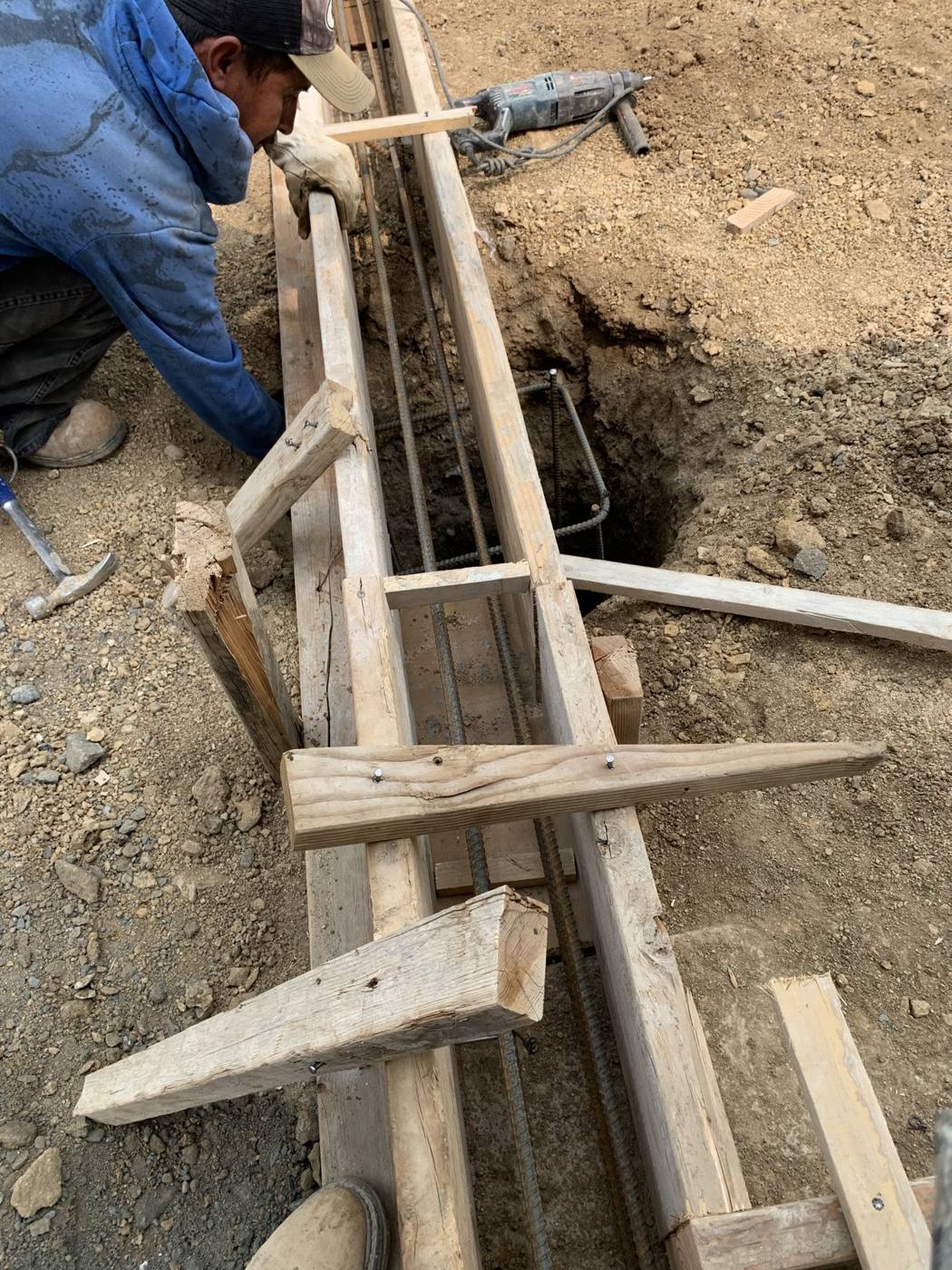 Grade beam forms and reinforcing