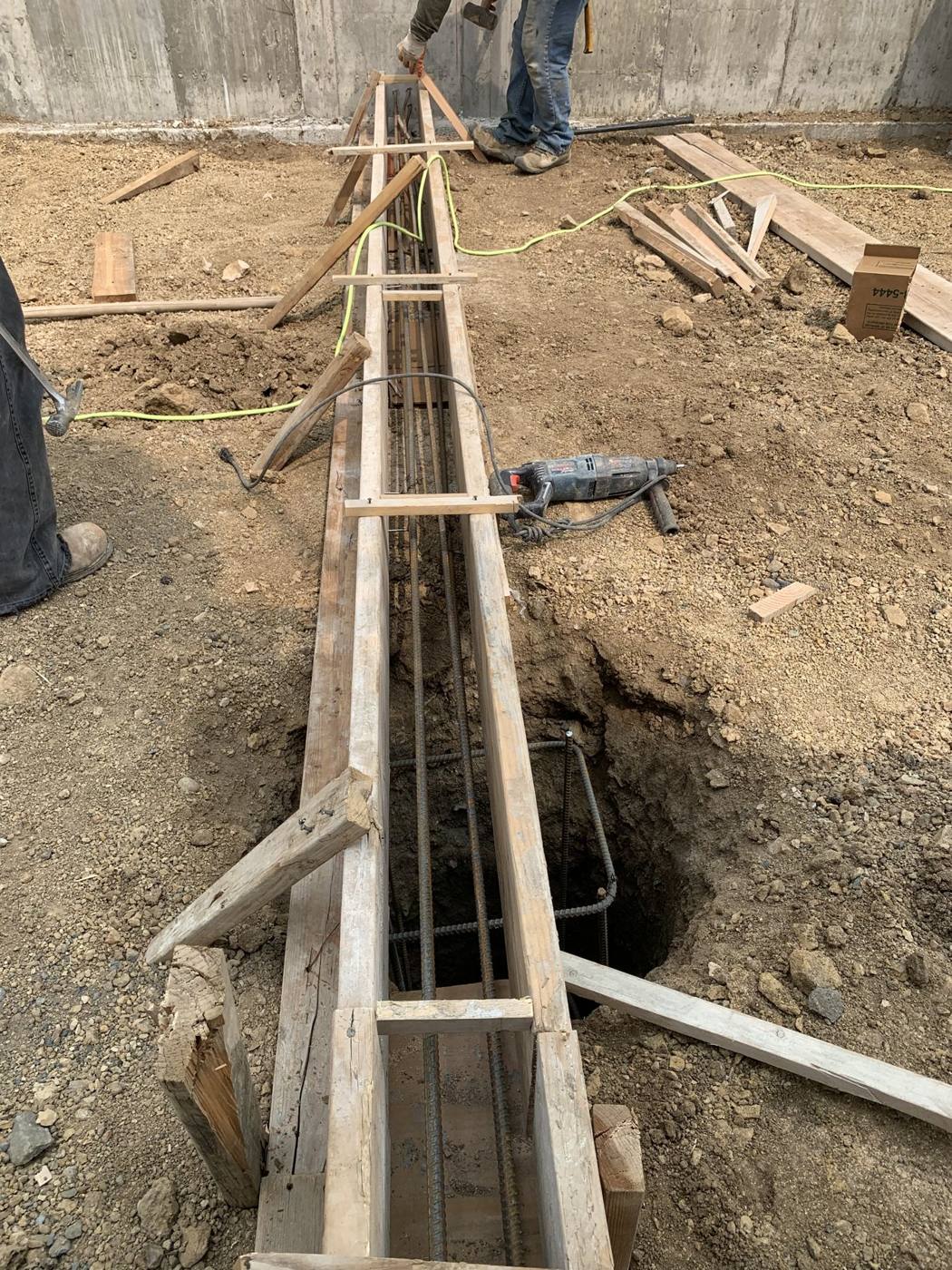 Grade beam forms and reinforcing