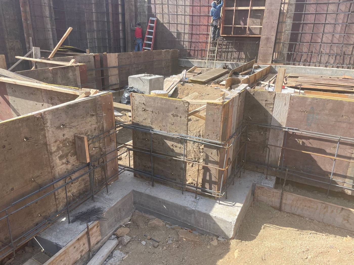 Formed walls and stepped footings