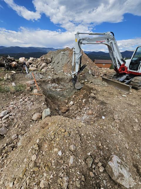 Excavating rock for the foundation