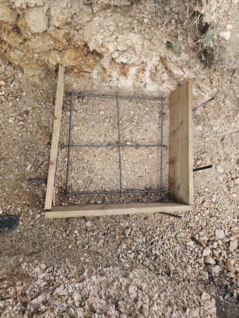 Footing rebar set in rock