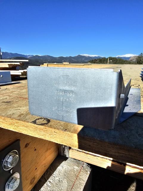 Steel connector at a beam