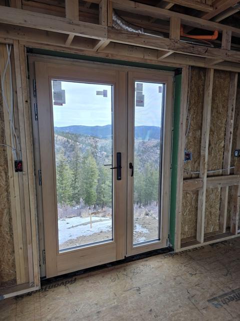 French doors to the forest