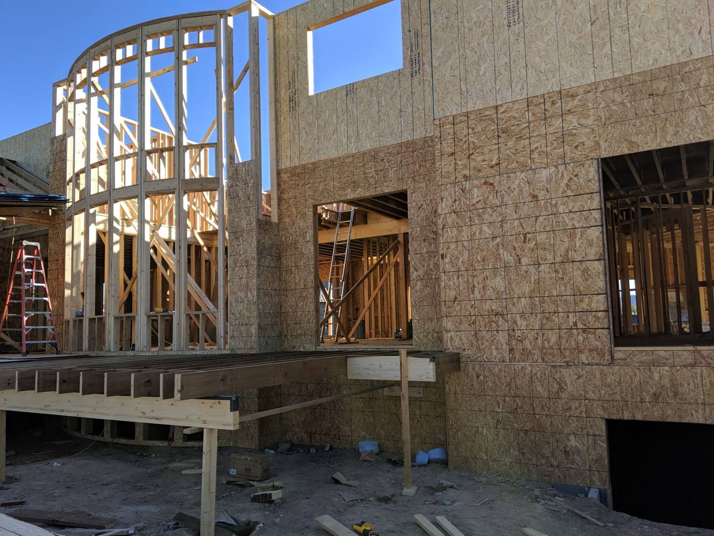 Curved two-story wall framing